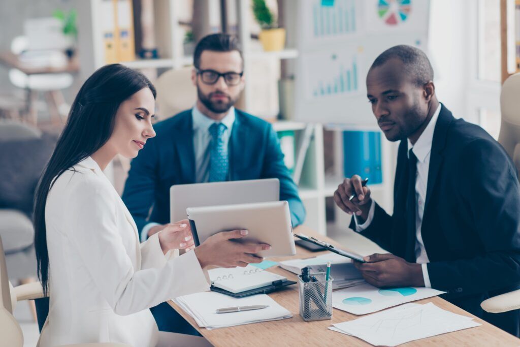 Happy family reviewing financial plans